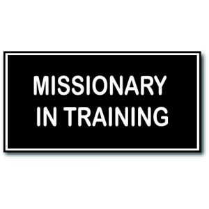 small rectangle imitation LDS missionary tag, black background with the words Missionary In Training engraved in white